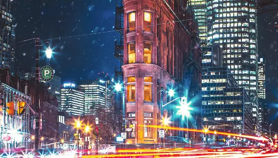 Night shot of historic building in downtown Toronto.